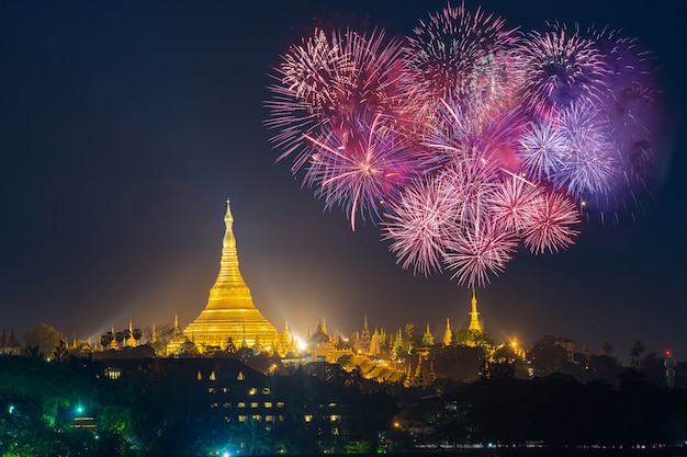 Premium Photo | Shwedagon pagoda with with fireworks celebration new ...