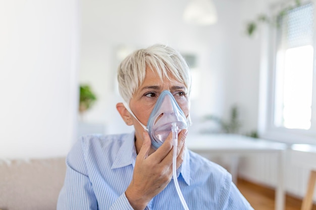 Premium Photo | Sick elderly woman on oxygen mask inhalation, pneumonia ...