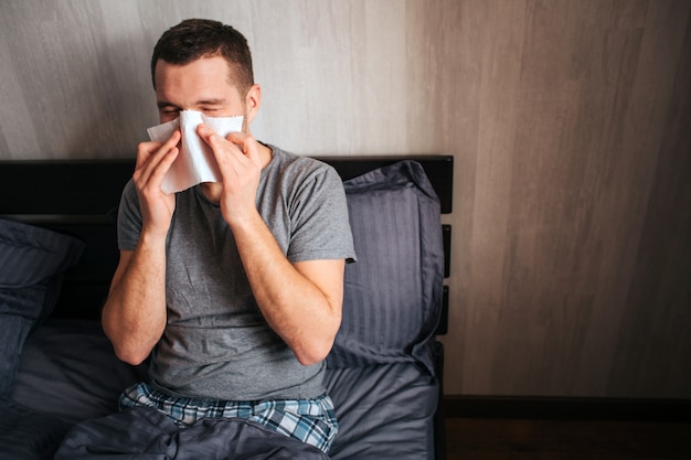 Premium Photo | Sick guy has runny nose