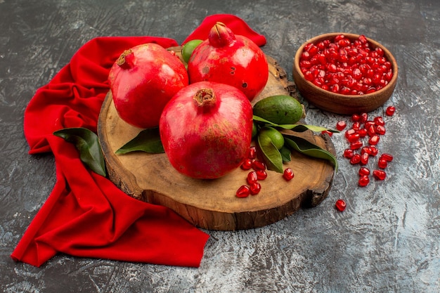 Free Photo | Side close-up view pomegranates pomegranates on the board ...