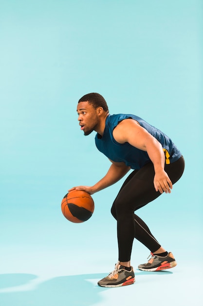 man playing basketball