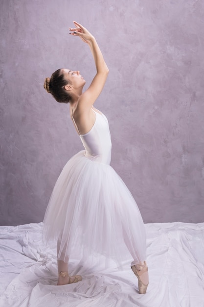 Free Photo | Side view ballerina standing position