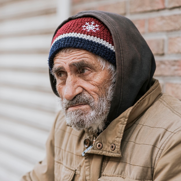 Free Photo | Side view of bearded homeless man