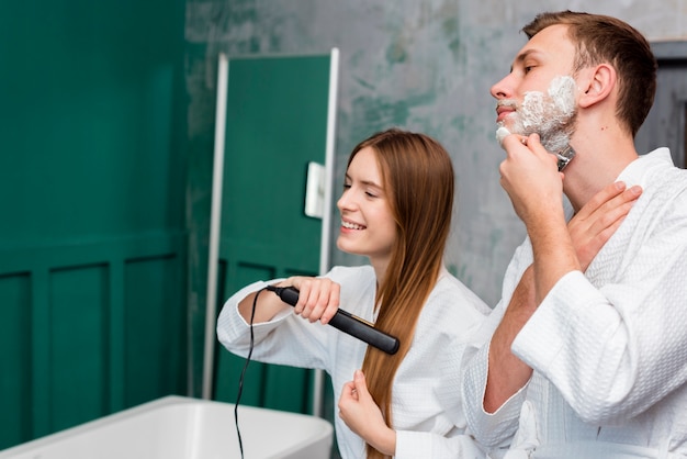 side-view-couple-shaving-straightening-hair_23-2148389836.jpg (626×417)