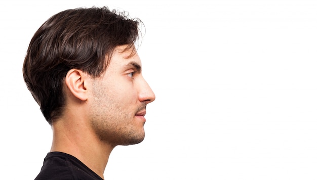 Side view of a handsome young man facial portrait isolated