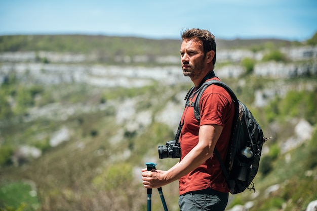 Premium Photo Side View Of Hiker With Trekking Poles With Rucksack