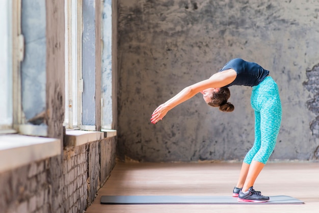 Free Photo | Side view of slim young woman turning backward