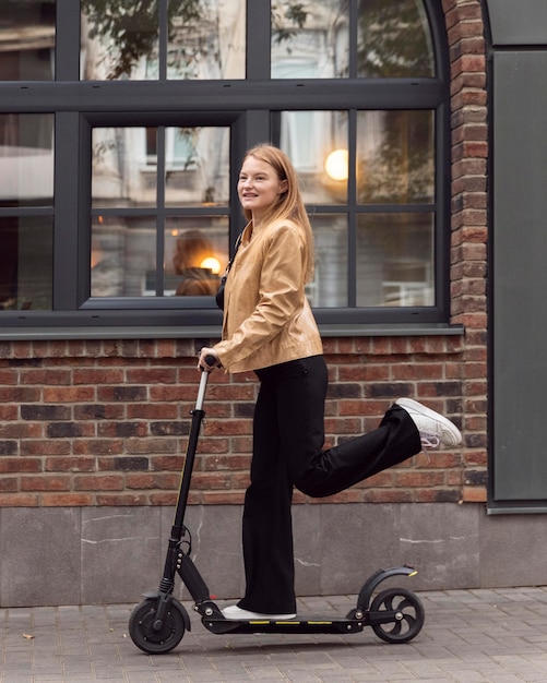 Free Photo Side View Of Woman Riding Elect