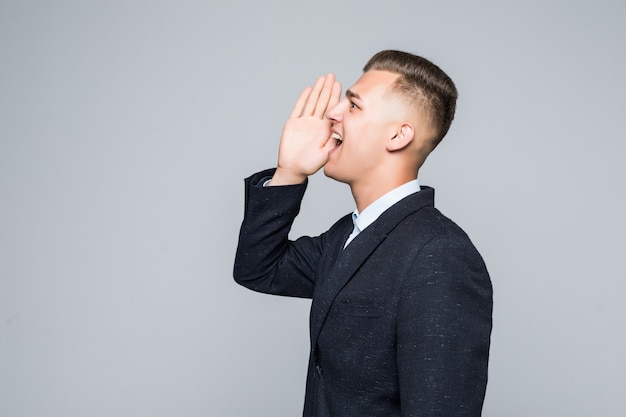 Free Photo Side View Of A Young Man Holding His Arm Near Mouth And