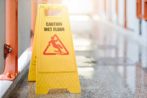 Sign showing warning of caution wet floor 