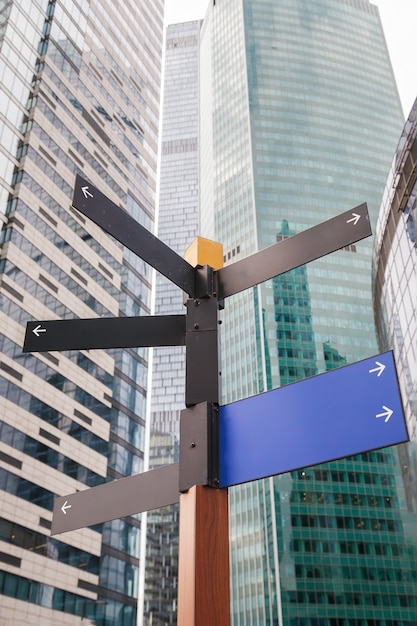 premium-photo-signpost-with-street-direction-mock-up-in-the-city-downtown