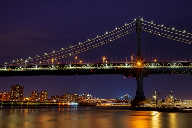 Premium Photo | Silhouette of manhattan bridge manhattan skyline at night