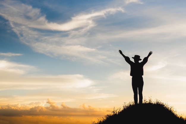 silhouette-woman-celebrating-success-top