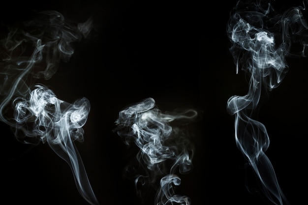 Free Photo | Silhouettes of smoke with different shapes