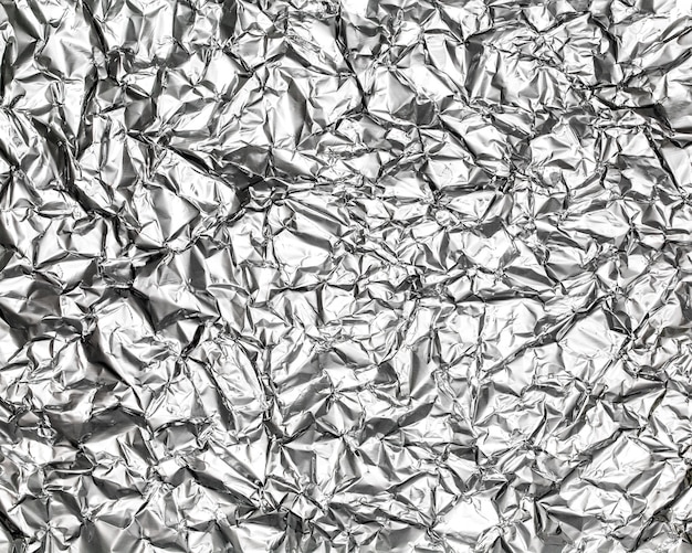 Premium Photo | Silver leaf foil background with shiny crumpled uneven ...