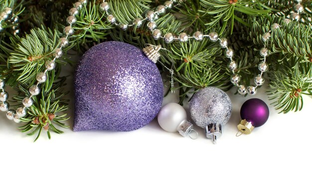 Premium Photo Silver And Purple Christmas Ornaments Border On White Close Up