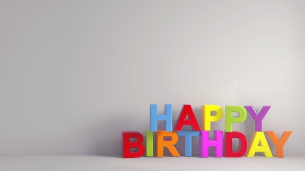 Free Photo | Simple colorful happy birthday text near a grey wallpaper