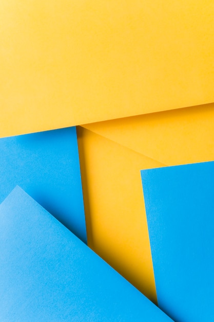 シンプルな幾何学的な黄色と青のカードの背景 無料の写真