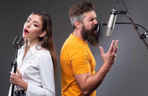 Premium Photo | Singer duet couple is performing a song with a ...