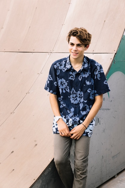 Free Photo | Skater boy posing with skateboard