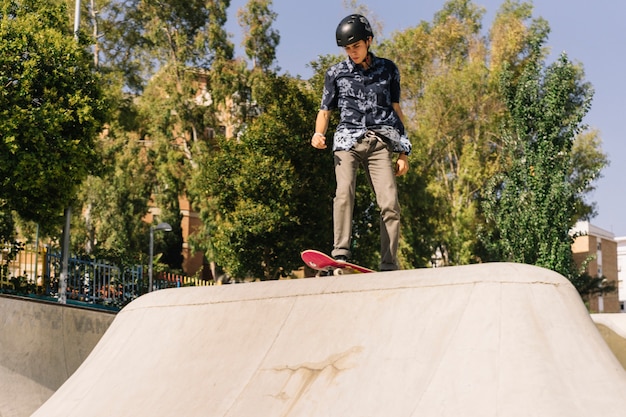 Skater boy with helmet Free Photo