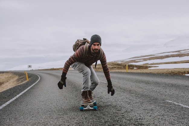Premium Photo Skater Traveling Iceland On His Longboard