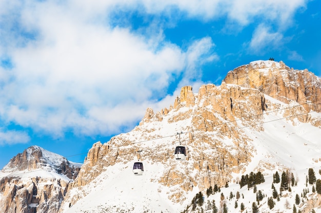 Premium Photo | Ski lift in val di fassa ski resort in winter dolomite ...