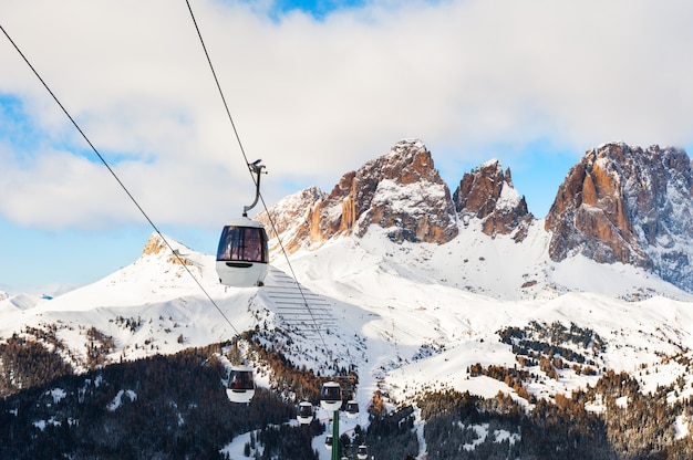 Premium Photo | Ski lift in val di fassa ski resort in winter dolomites ...