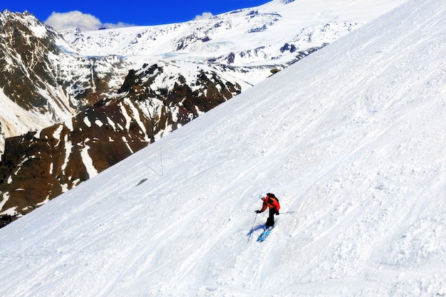 Premium Photo A Skier Descending Mount Elbrus The Highest Peak In