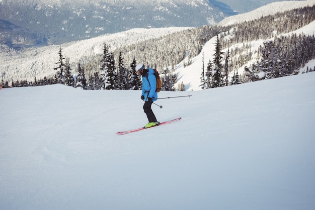 Free Photo | Skier skiing on snowy mountains