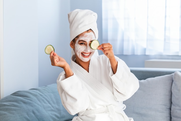 Skin care and beauty treatments with mask on her face Premium Photo
