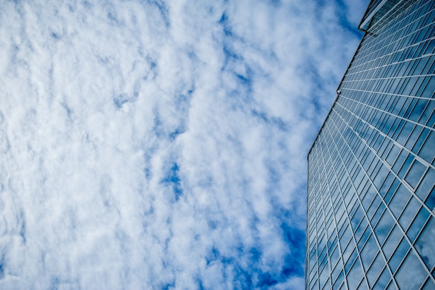 Premium Photo | Skyscraper on a background of clouds