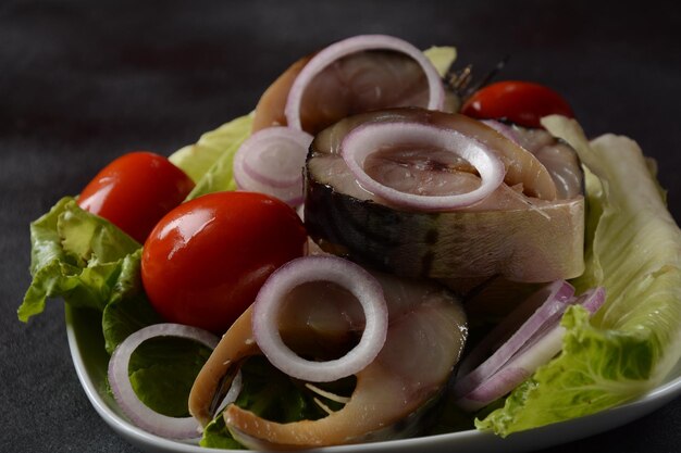 premium-photo-sliced-pieces-of-cold-smoked-mackerel-fish-with-cherry