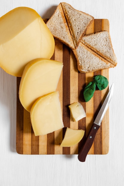 Premium Photo | Slices of holland cheese edam and dutch goat cheese ...