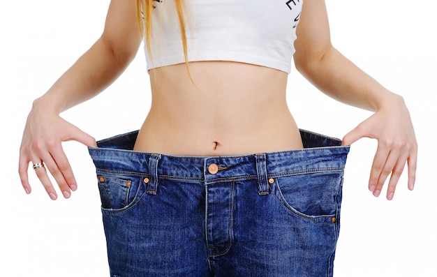 Premium Photo Slim Stomach Girl In Jeans Large