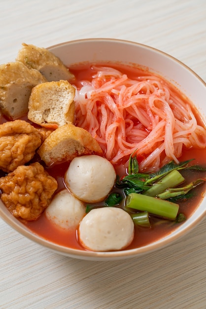 Premium Photo | Small flat rice noodles with fish balls and shrimp ...