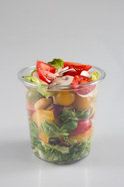 Download Premium Photo A Small Fresh Salad In A Plastic Container Of A Snack Food Truck Or Take Away