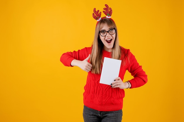 Smart funny woman holding book with copy space cover reading with glasses Premium Photo
