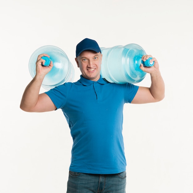 smiley-delivery-man-carrying-water-bottl