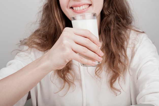 free-photo-smiley-girl-wanting-to-drink-some-milk