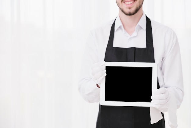 Download Free Photo Elegant Waiter Holding A Dataphone