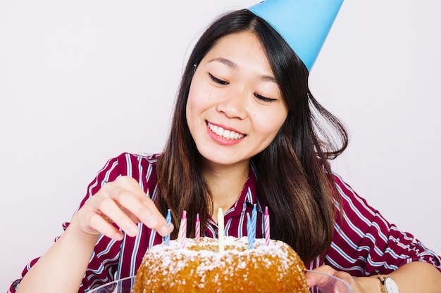 Free Photo | Smiling birthday girl with cake