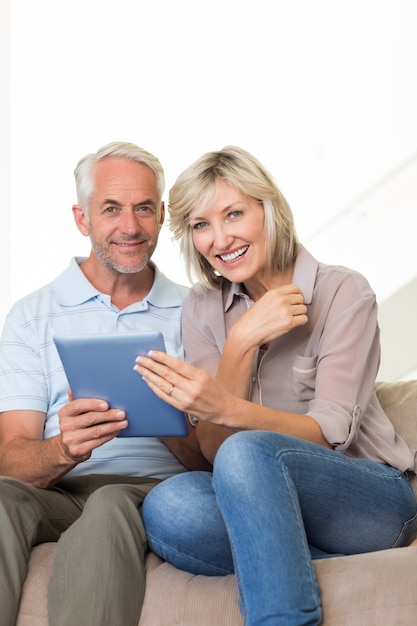 Mature Couple Use Digital Tablet