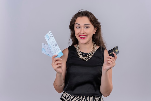 free-photo-smiling-young-female-traveler-wearing-black-undershirt