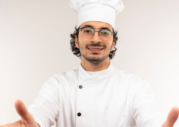 Free Photo | Smiling young male cook wearing chef uniform and glasses ...