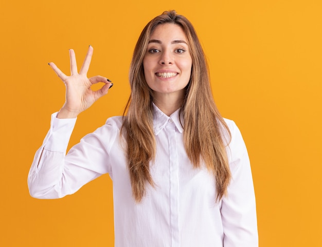 Free Photo | Smiling young pretty caucasian girl gestures ok hand sign