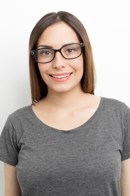 Premium Photo Smiling Young Woman In Glasses 