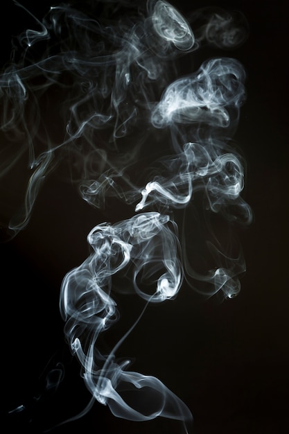 Smoke silhouette with wavy shapes Photo | Free Download