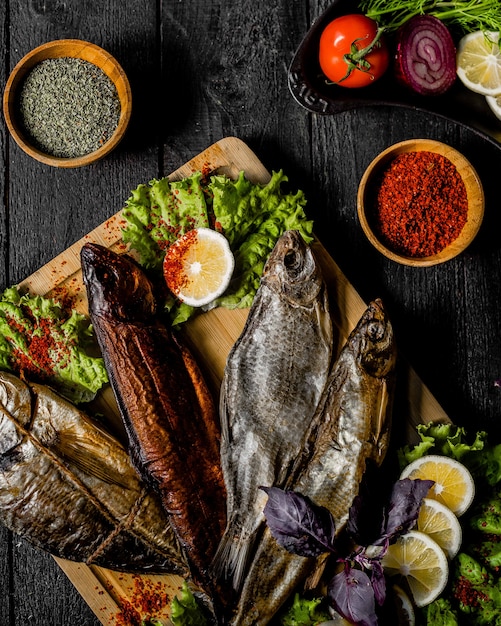 Free Photo Smoked and griled whole fish with spices and