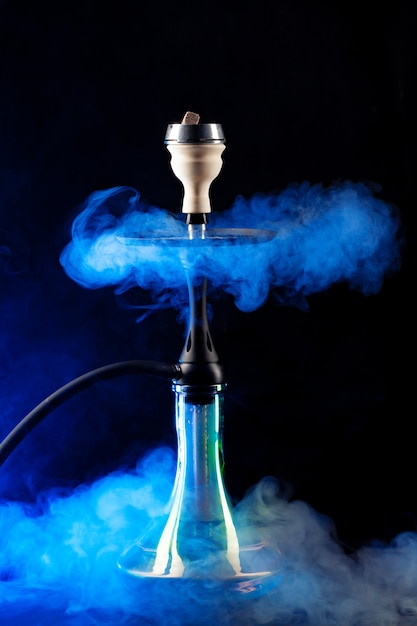 Premium Photo | Smoking hookah on black background with color fog copy ...